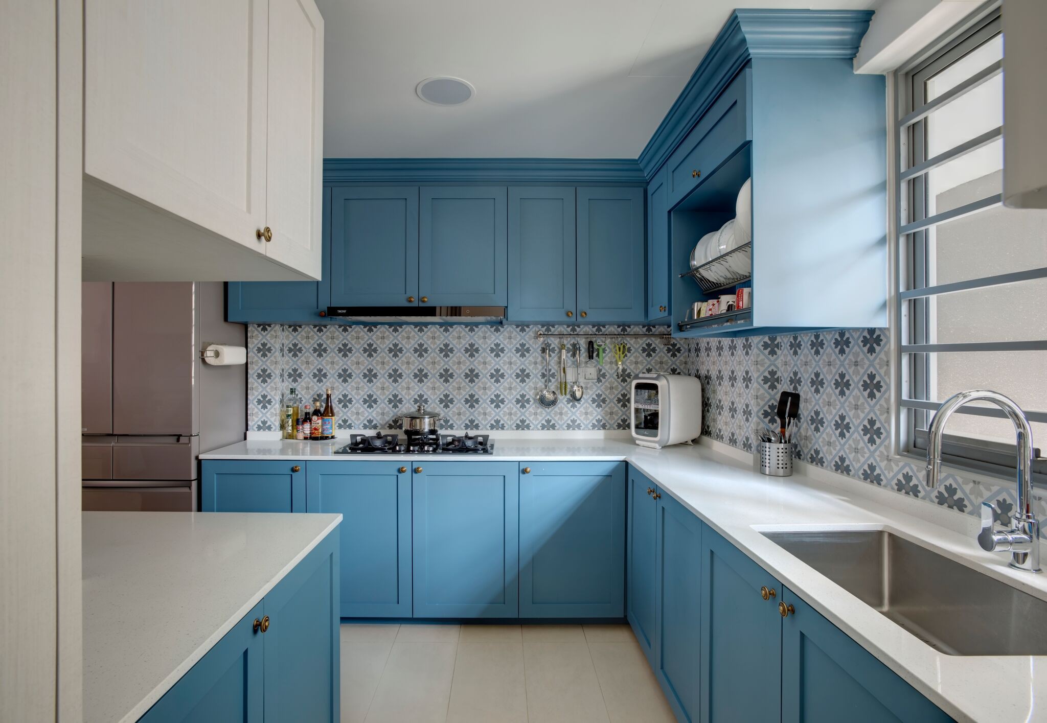 Rustic kitchen designed in blue hues