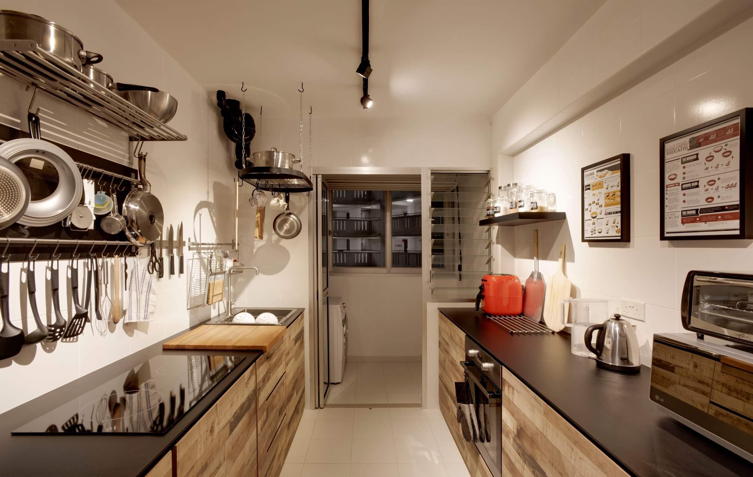 Industrial Kitchen with exposed shelves and parallel counters