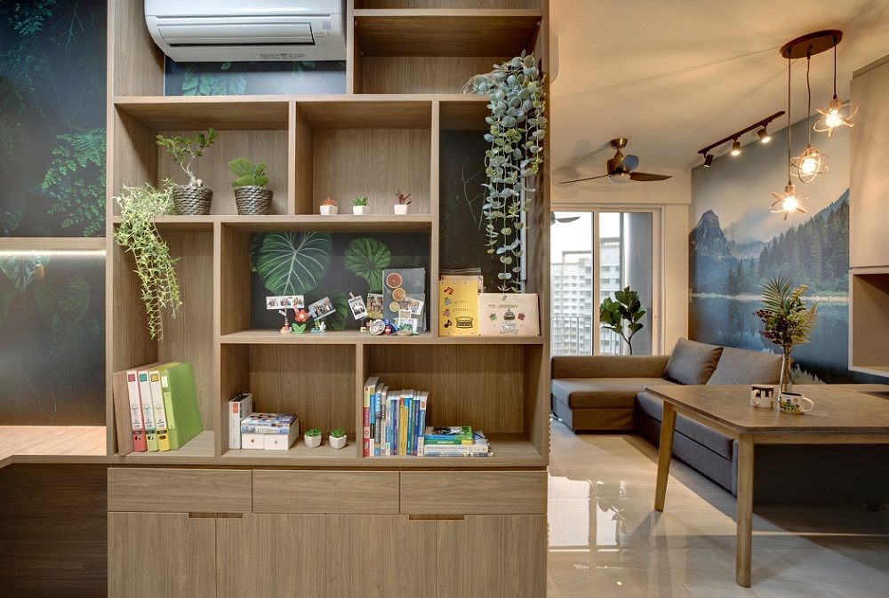 Living room designed in wooden elements with lots of plants decor