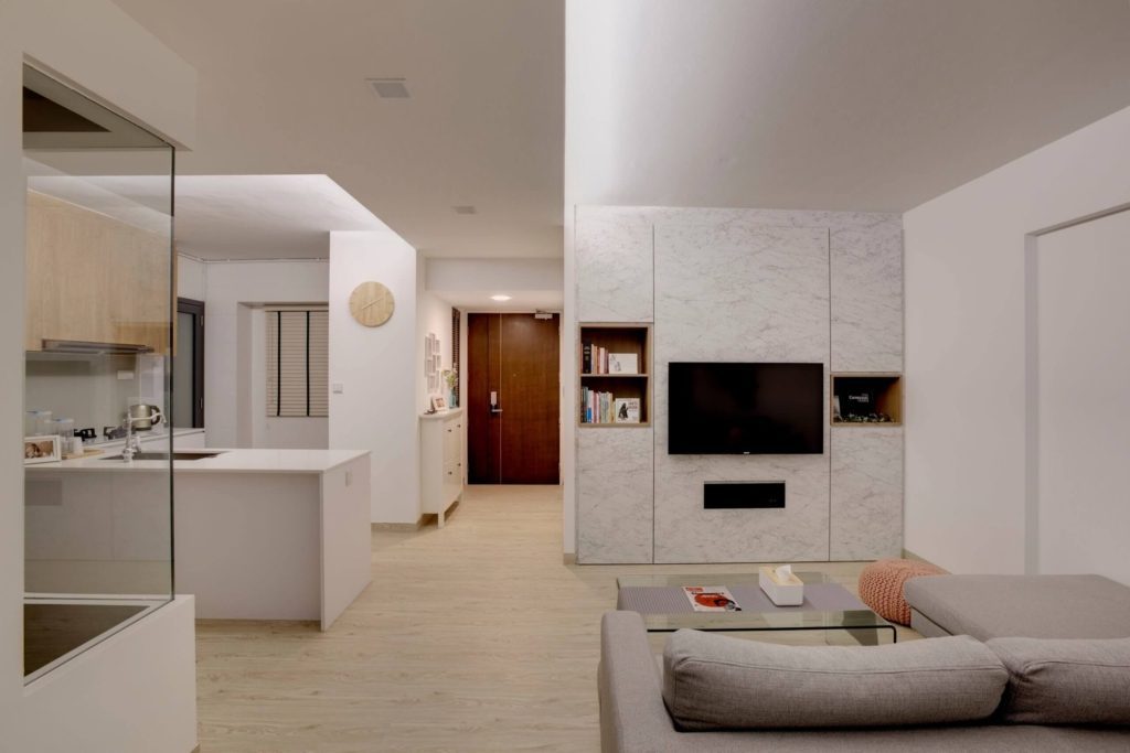 Open-floor living room design in white hues