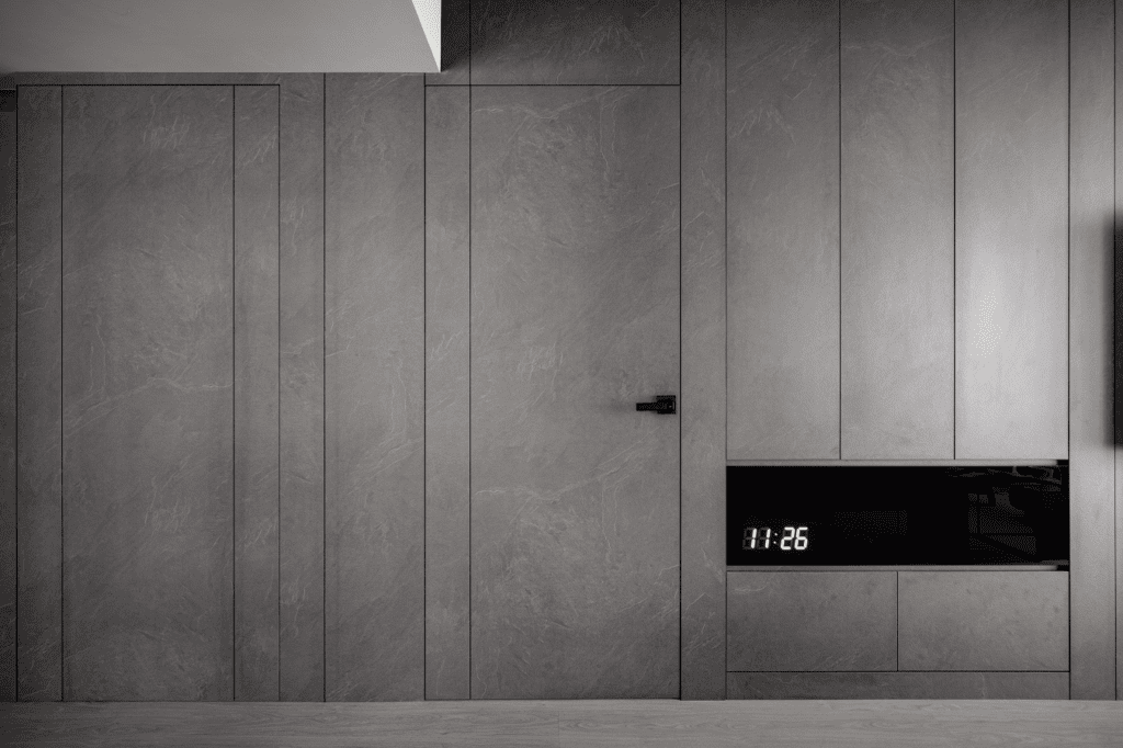 Concealed grey door in the wall