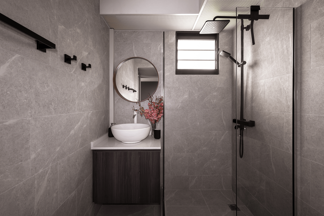 Simple yet elegant grey bathroom with pink flowers