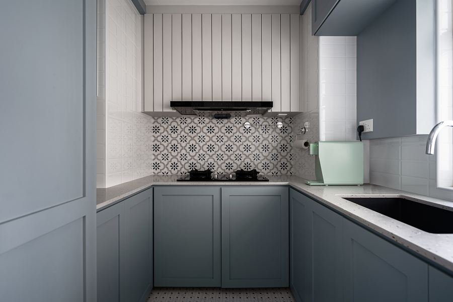 Scandinavian farmhouse kitchen in pale blue hues