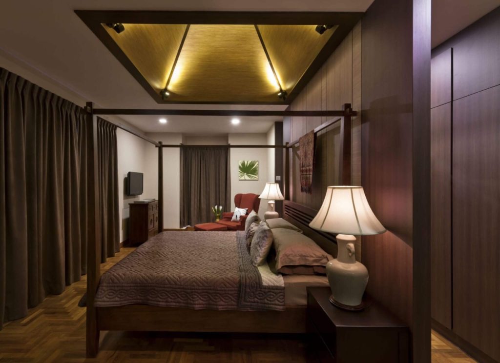 Traditional bedroom with dramatic lighting