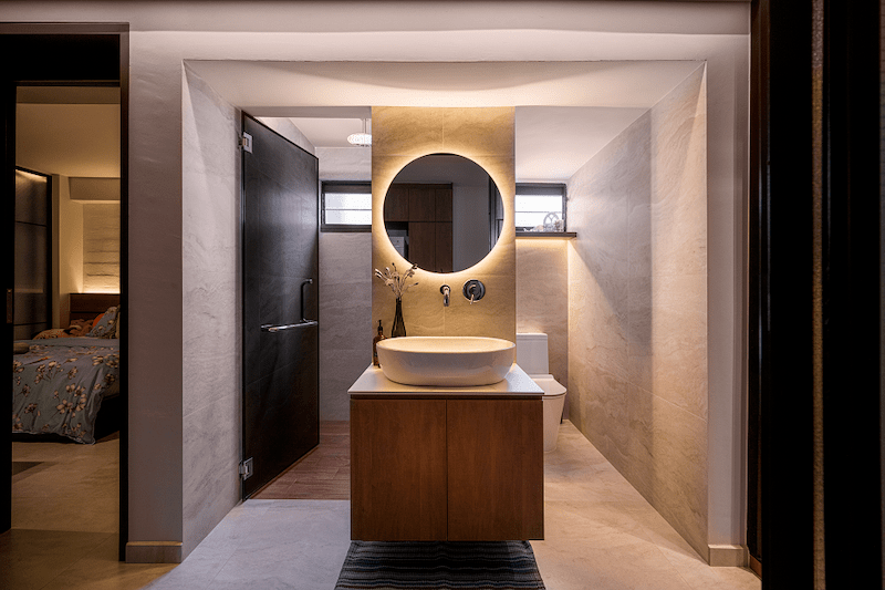 Toilet and shower room with a sink and vanity in the middle