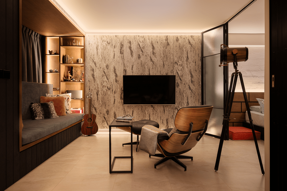 Modern living room with a relaxing chair and guitar