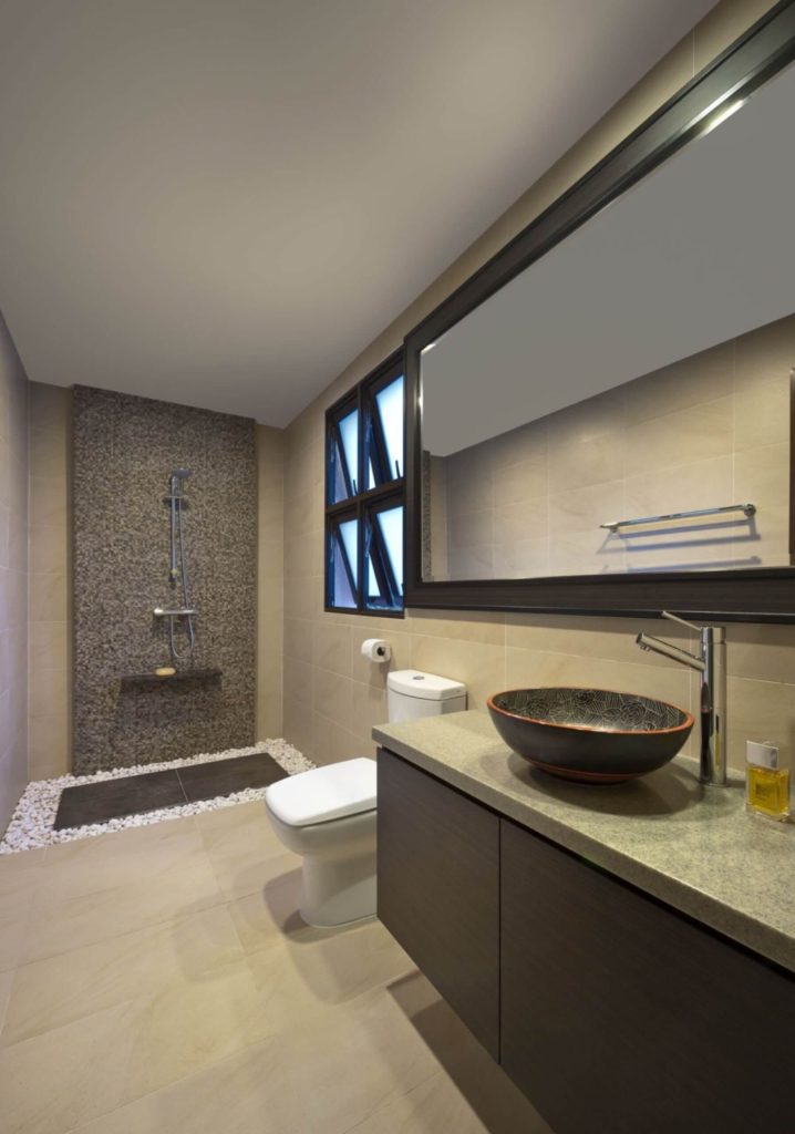 Resort-style bathroom with decorative stones