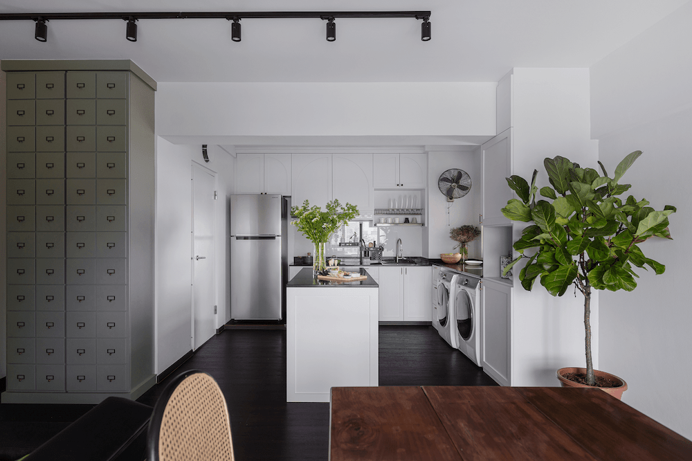 White kitchen with green plants