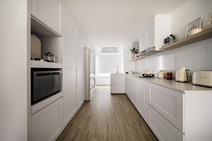 White minimalist functional kitchen