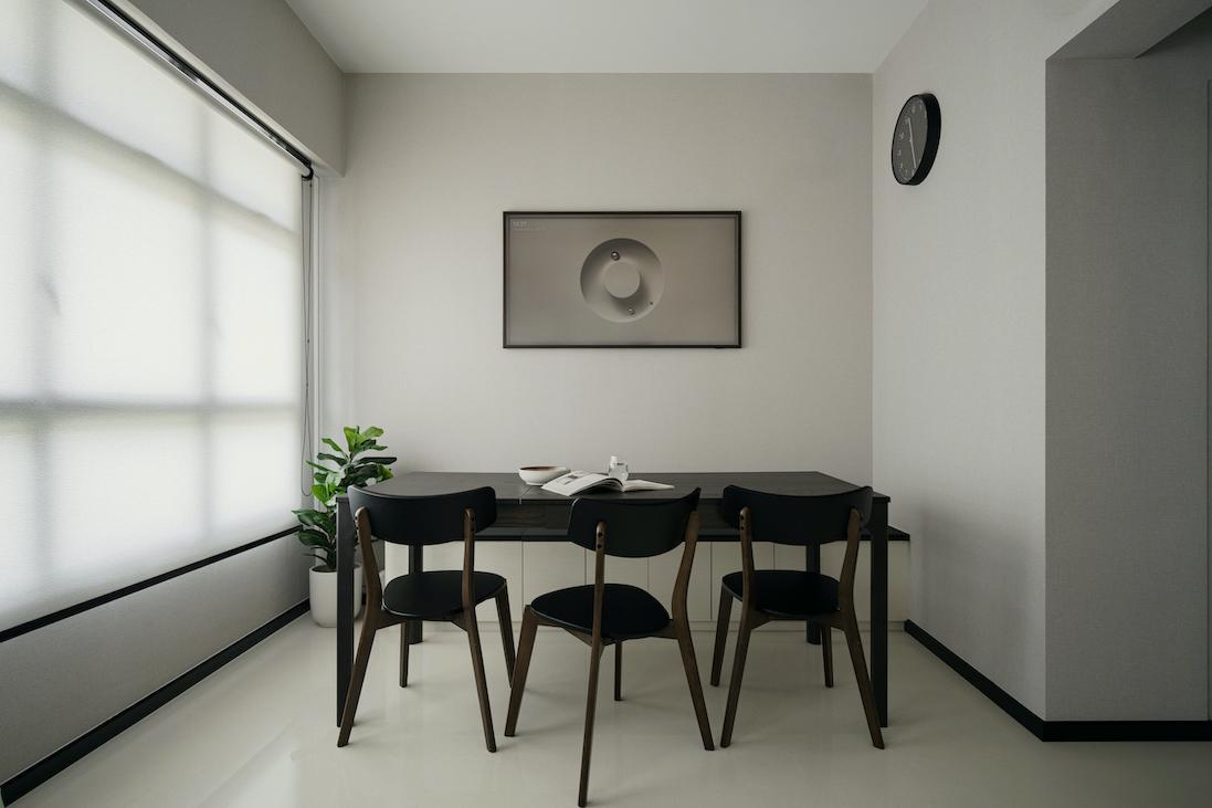 Minimalist monochrome dining area