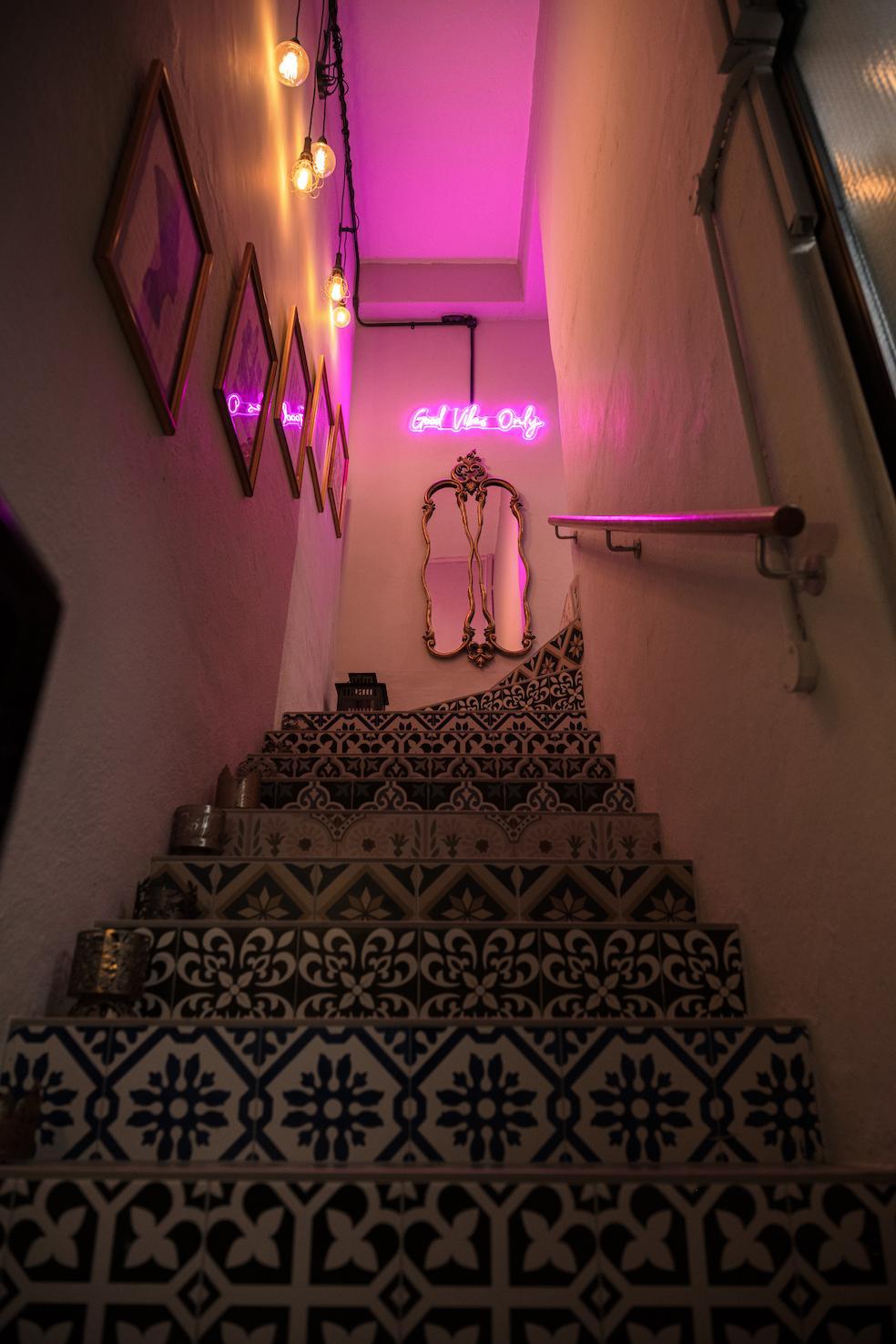 Vintage staircase with neon lighting
