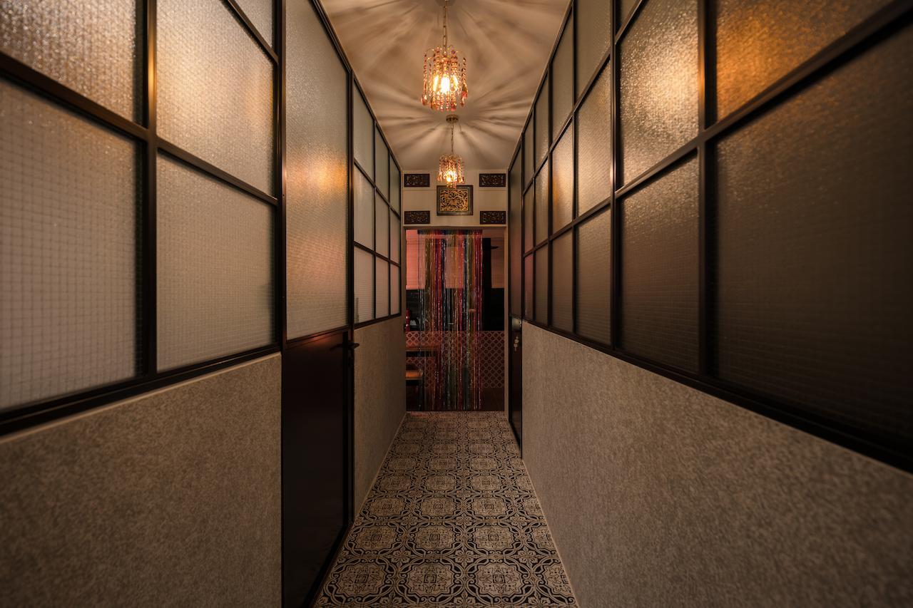Passageway with smoked glass partitions